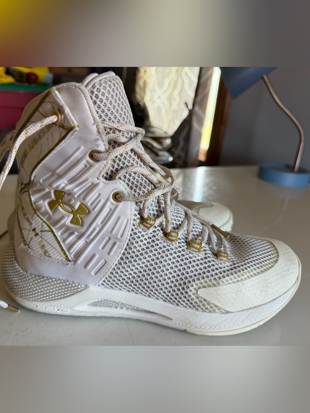 Under Armour White and Gold High-Top Athletic Sneakers